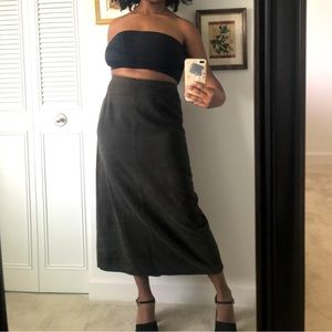 Long skirts are IN! Size 10 ankle-length skirt with slit in the back, dark color